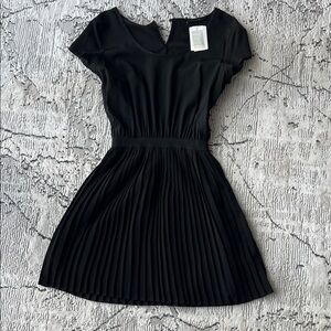 Chic Black Pleated Mini Dress